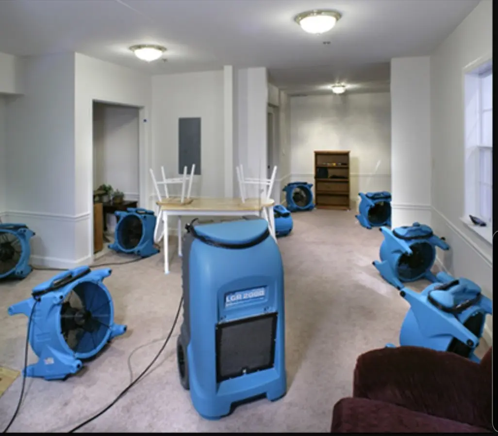 Air movers and dehumidifier setup for Water Damage Restoration in Boylston